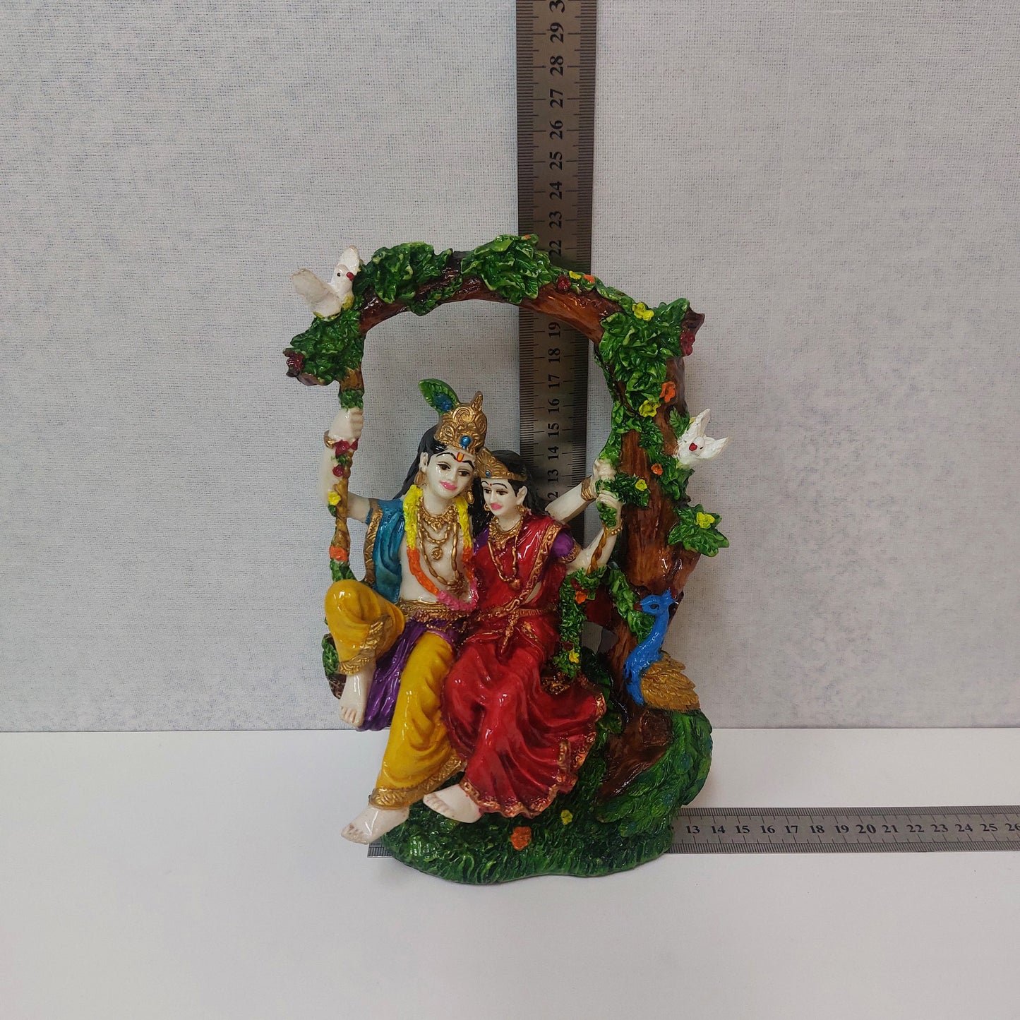 Radha Krishna Idol Decorative Showpiece/ Radha Krishna Sitting on Jhula Statue
